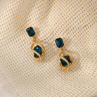 Revive your style with our Retro Emerald Stud Earrings for a touch of creative and fashionable flair.