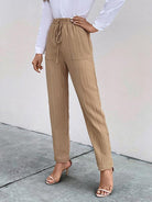 Stay comfortable and stylish with our Casual Elastic Waist Pleated Women's Pants, perfect for a relaxed and chic look.