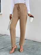 Stay comfortable and stylish with our Casual Elastic Waist Pleated Women's Pants, perfect for a relaxed and chic look.