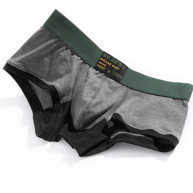 Upgrade your underwear game with our Men's Low Waist Sports Boxers.