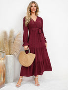 Women's casual belted dress with large hem