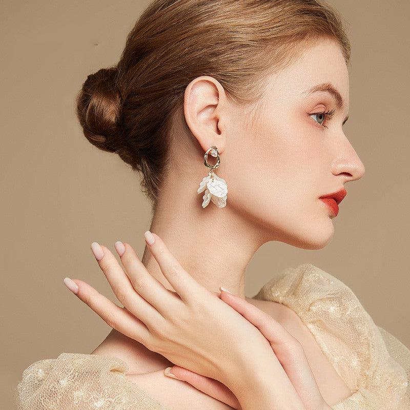 Elevate your style with our Women's Foreign Style White Petal Earrings, perfectly suited for silver pins. - Bloomjay