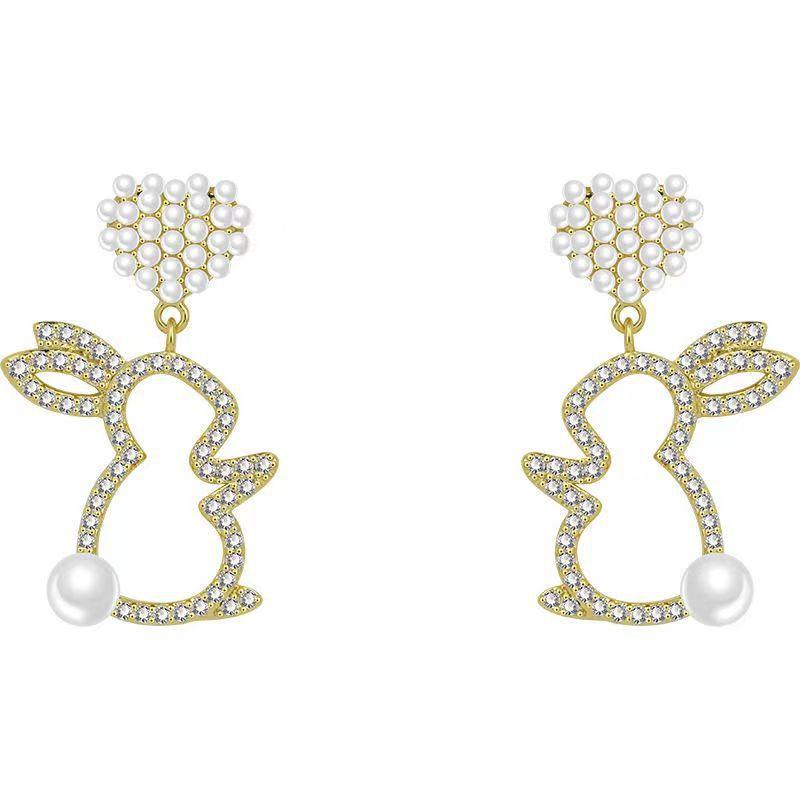 Adorn your ears with our Pearl Bunny Earrings, featuring a silver pin for a charming and stylish addition to your jewelry collection. - Bloomjay